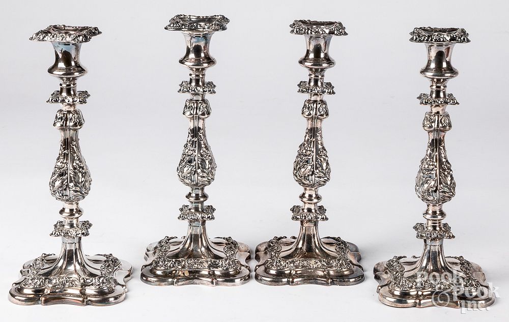 Appraisal: Set of four Sheffield plate candlesticks Set of four Sheffield