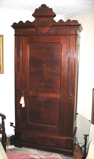 Appraisal: RENAISSANCE REVIVAL VICTORIAN ARMOIRE Walnut with single door over drawer