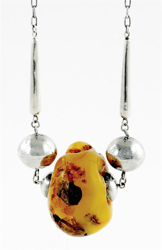 Appraisal: Amber bead pendant sterling necklace circa free-form amber bead flanked