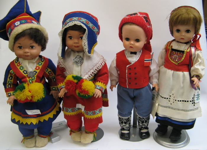 Appraisal: GROUP OF FOUR SCANDANAVIAN DOLLS dressed in handmade costumes One