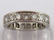 Appraisal: A white metal test platinum diamond full eternity ring estimated