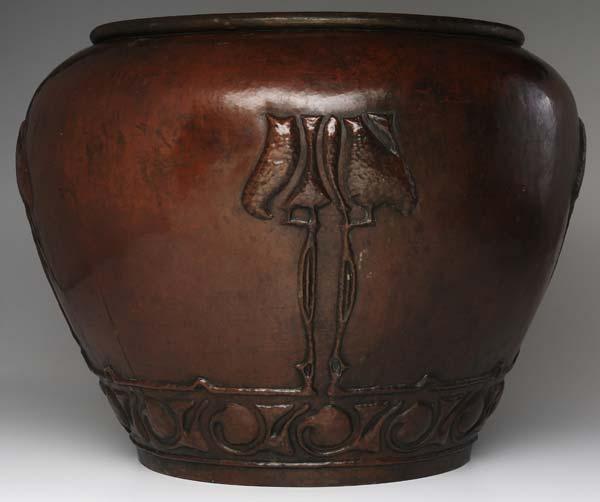 Appraisal: STICKLEY BROTHERS Massive hammered copper jardiniere embossed with stylized flowers