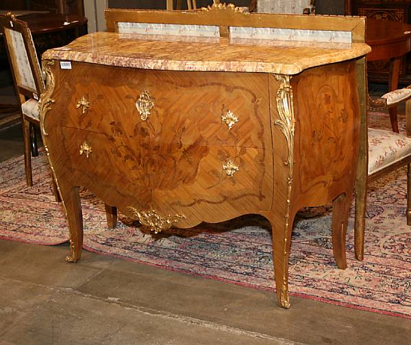 Appraisal: A Louis XV style gilt metal mounted inlaid satinwood commode