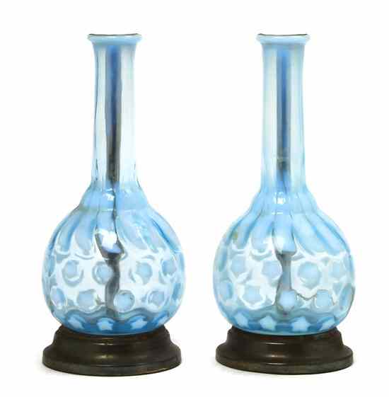 Appraisal: Two Victorian Glass Vases each of bottle form mounted as