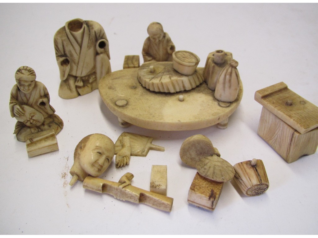 Appraisal: Box of carved ivory figures def