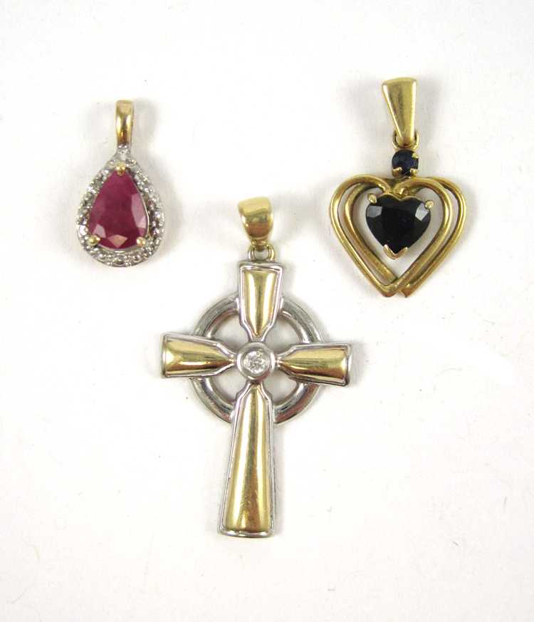 Appraisal: COLLECTION OF THREE GOLD PENDANTS including a k yellow and