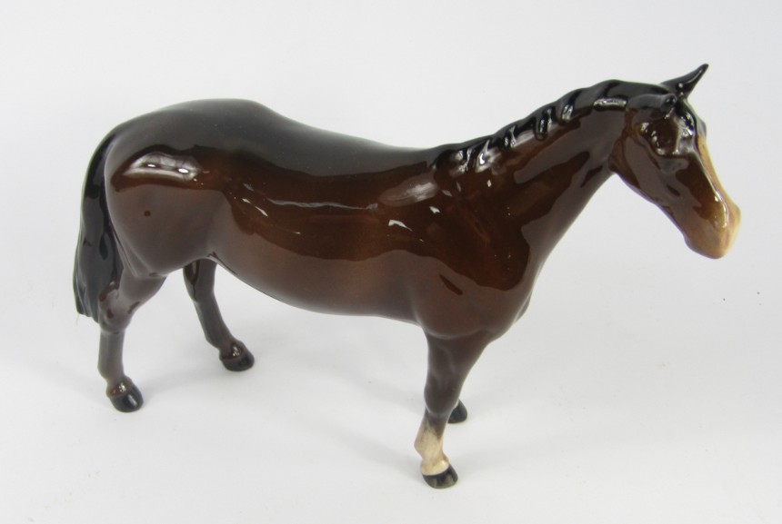 Appraisal: A Beswick brown glass horse tail attached to rear right