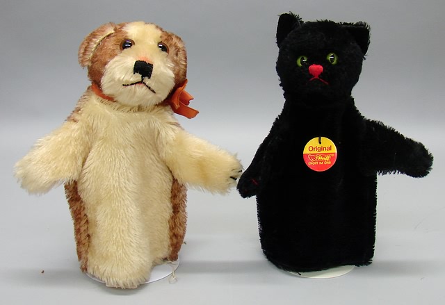 Appraisal: Pair of hand puppets Molly dog with brown glass eyes