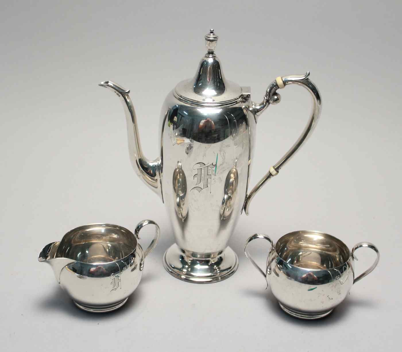 Appraisal: GORHAM MFG CO STERLING SILVER THREE-PIECE DEMITASSE SETConsists of a