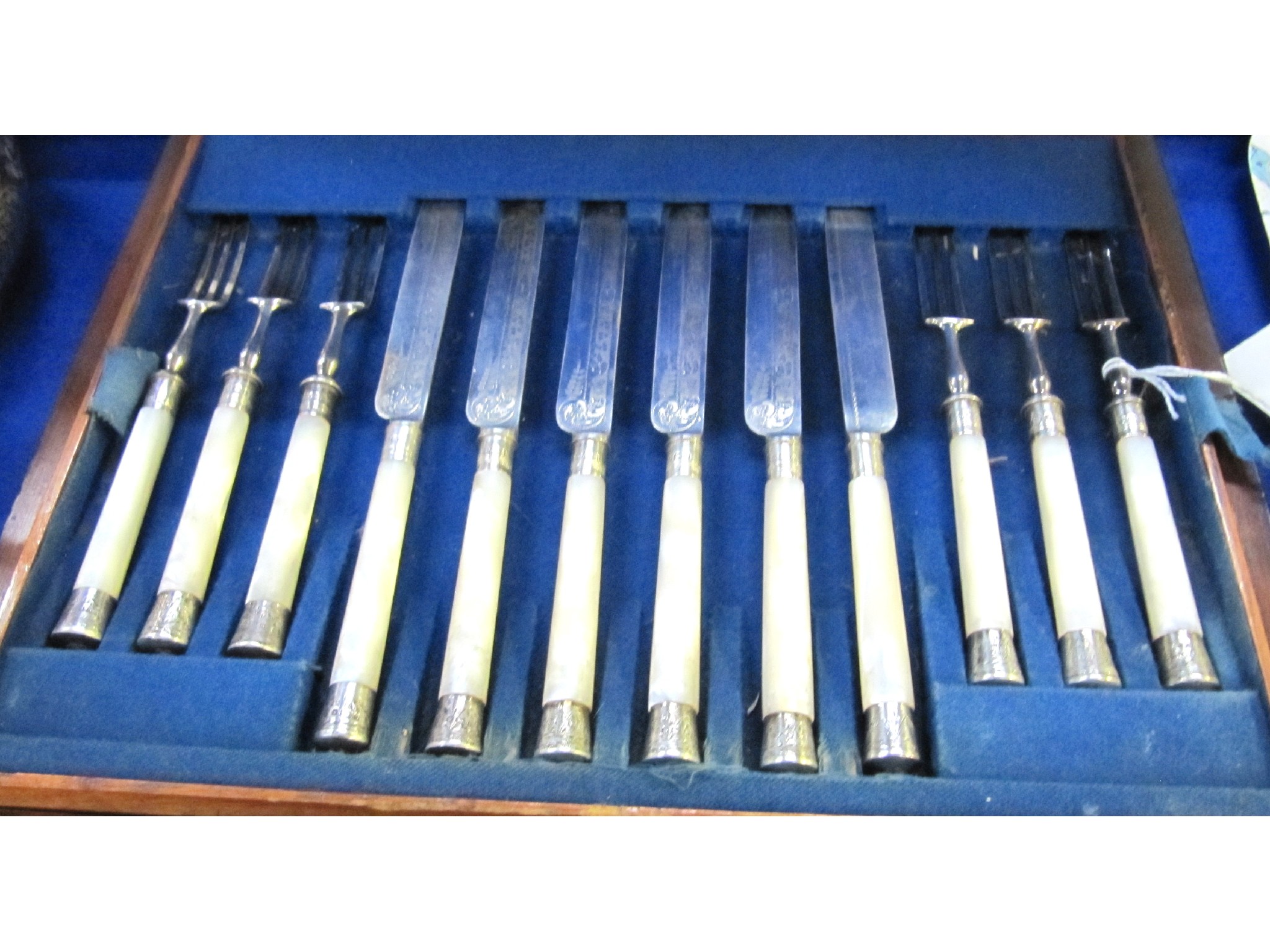 Appraisal: A cased part set twelve piece EP and mother of