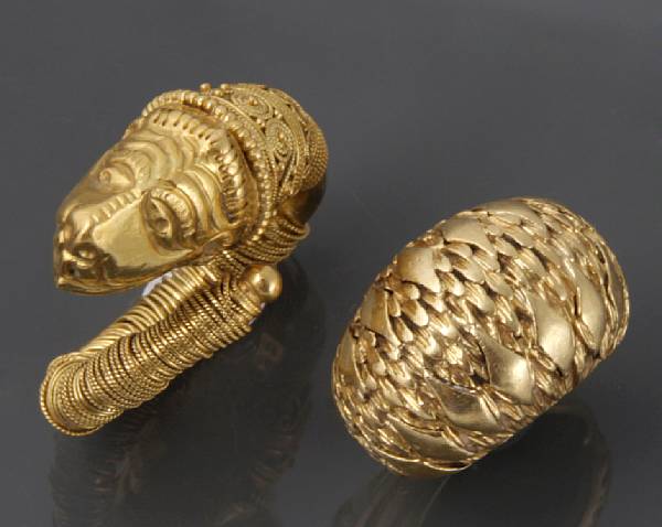 Appraisal: A collection of two k gold rings one gold wire