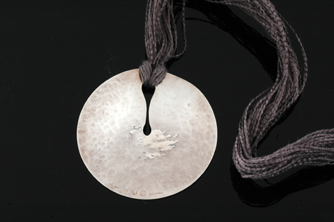 Appraisal: A silver pendant by San Lorenzo Designed by Naoko Shintani