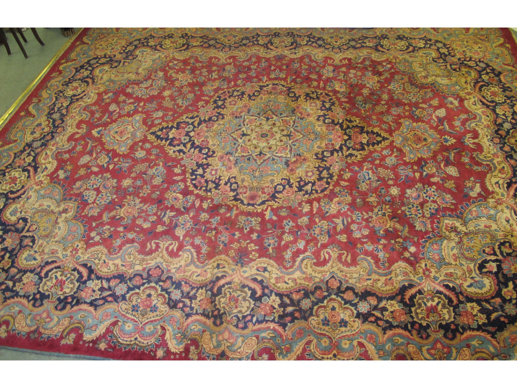 Appraisal: Large Kikman floral design on a red ground m x