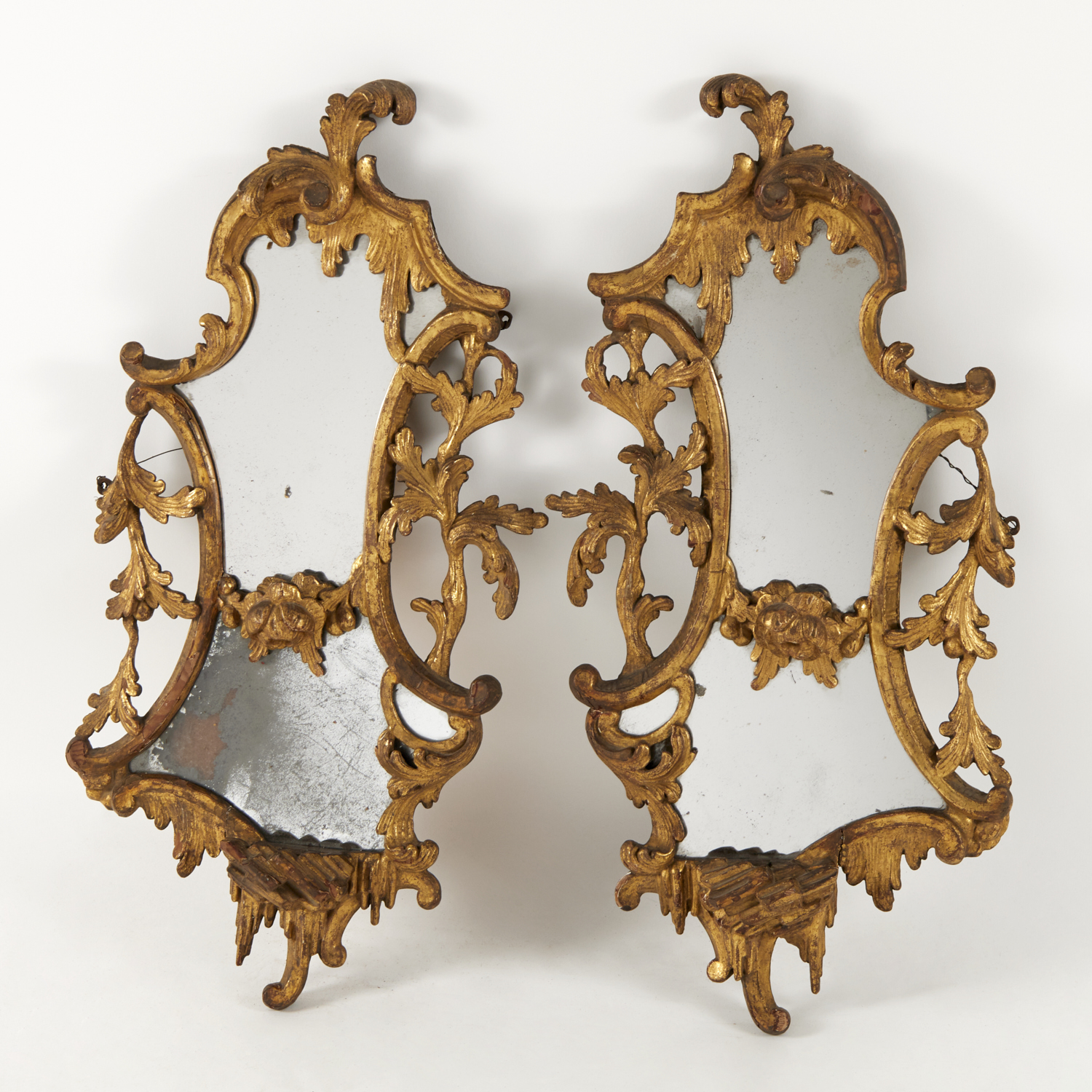 Appraisal: PAIR GEORGE III GILTWOOD MIRRORS th c England in the