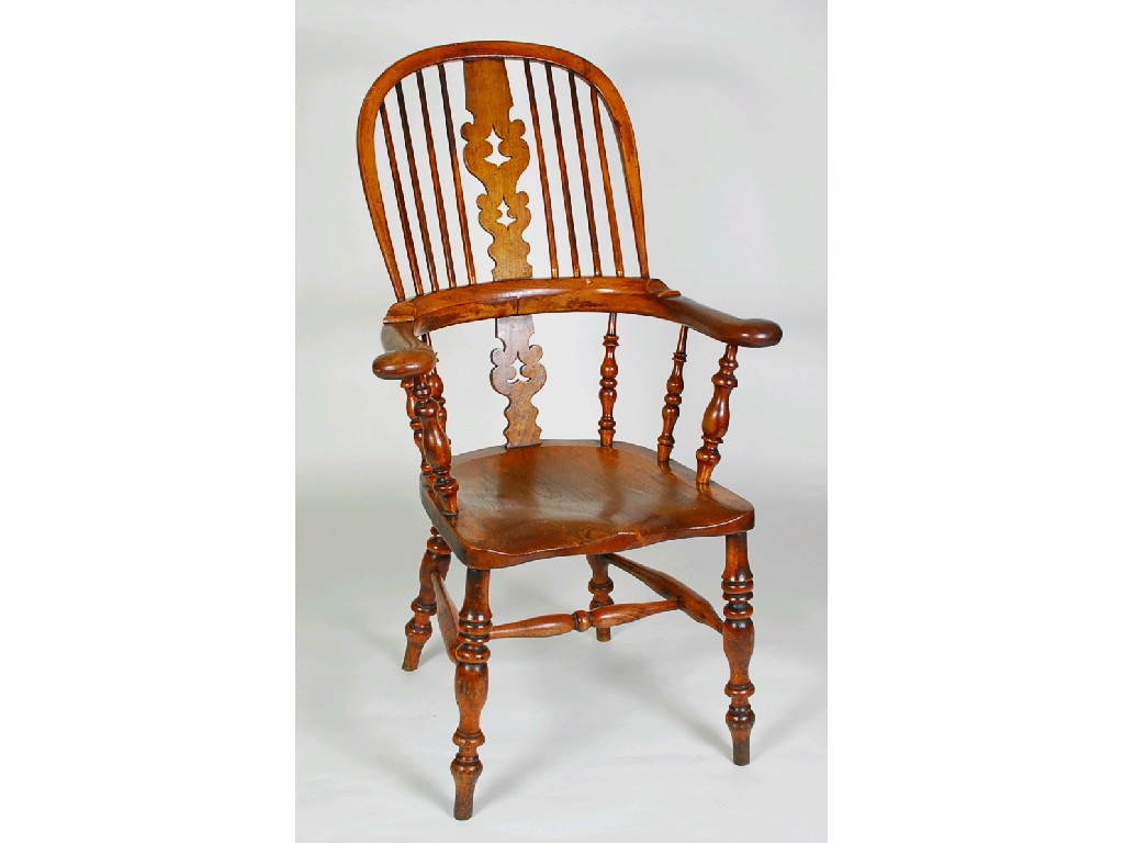 Appraisal: NINETEENTH CENTURY NORTHAMPTONSHIRE ELM AND FRUITWOOD HIGH BACK WINDSOR ARMCHAIR