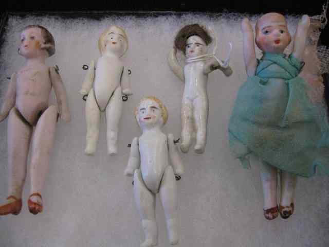 Appraisal: Bisque Miniature Dolls jointed '' to ''