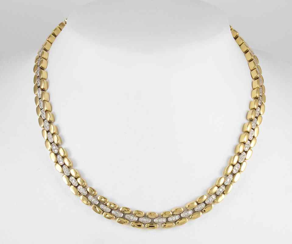 Appraisal: A SUBSTANTIAL K ITALIAN RIVIERE DIAMOND NECKLACE K yellow and