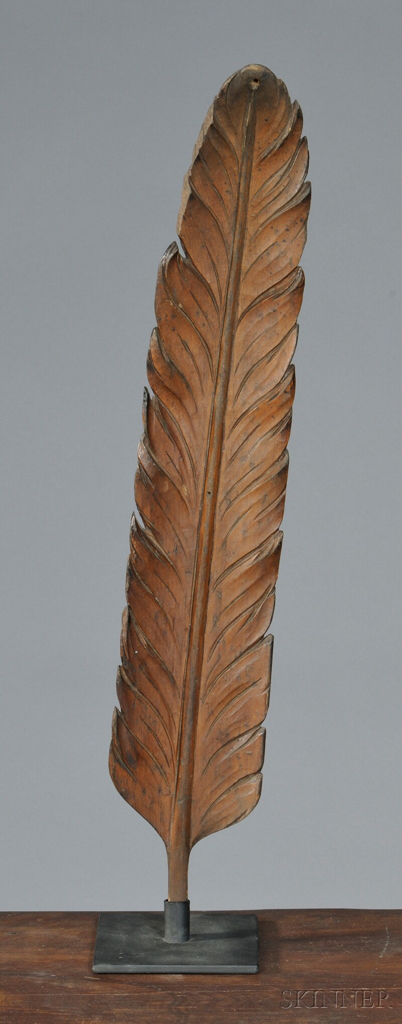 Appraisal: Carved Pine Feather America th century carved in the round