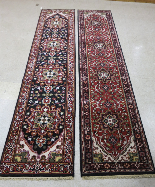 Appraisal: TWO SIMILAR ORIENTAL RUNNERS Indo-Persians each a four geometric medallion