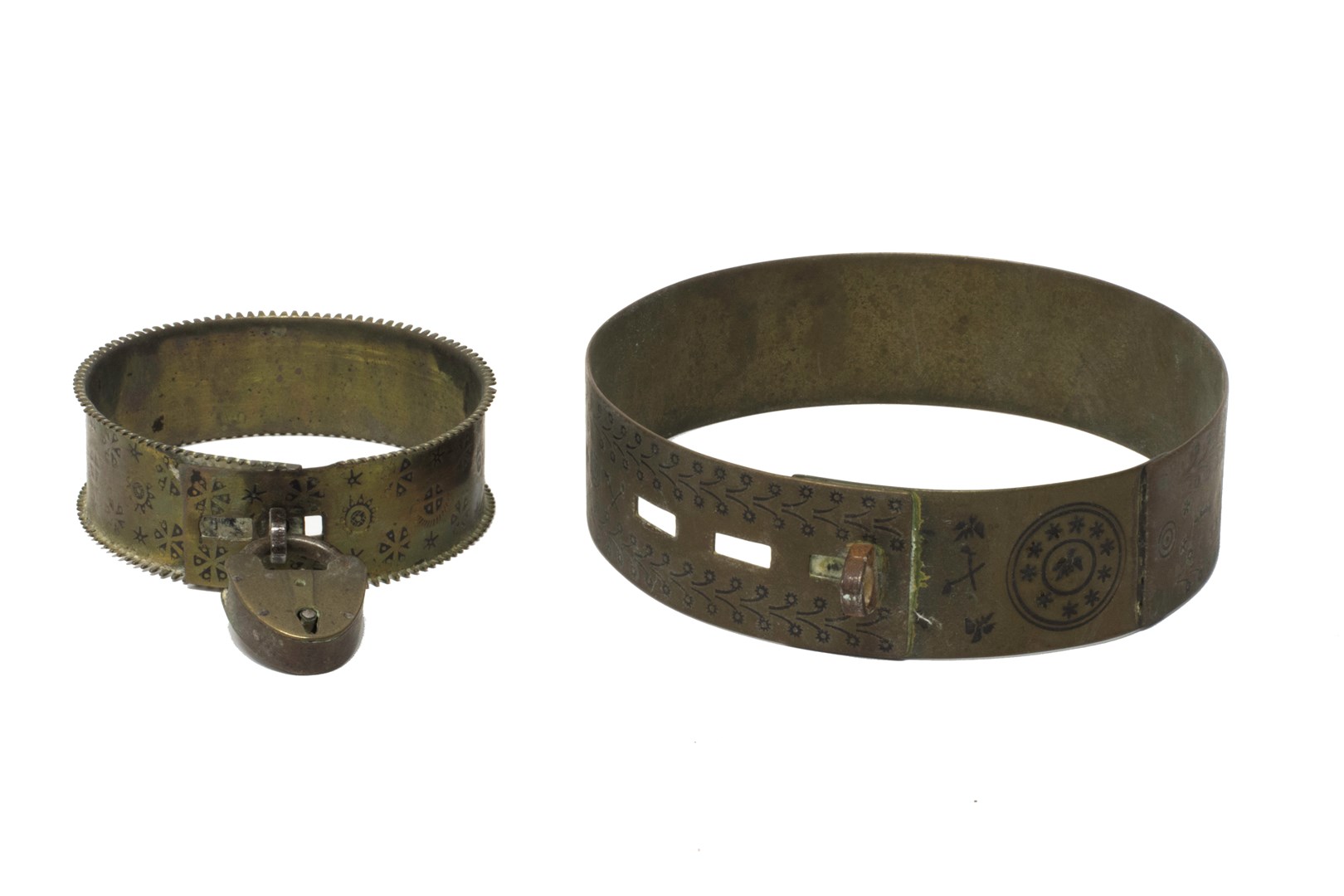 Appraisal: A Victorian brass dogs collar with engraved foliate banded decoration