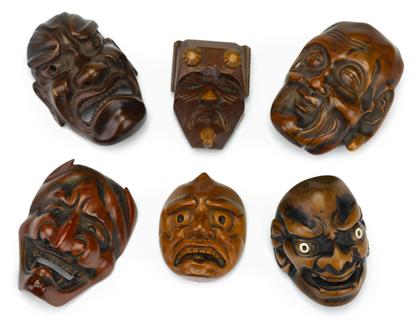 Appraisal: Collection of six Japanese carved boxwood mask-form netsuke