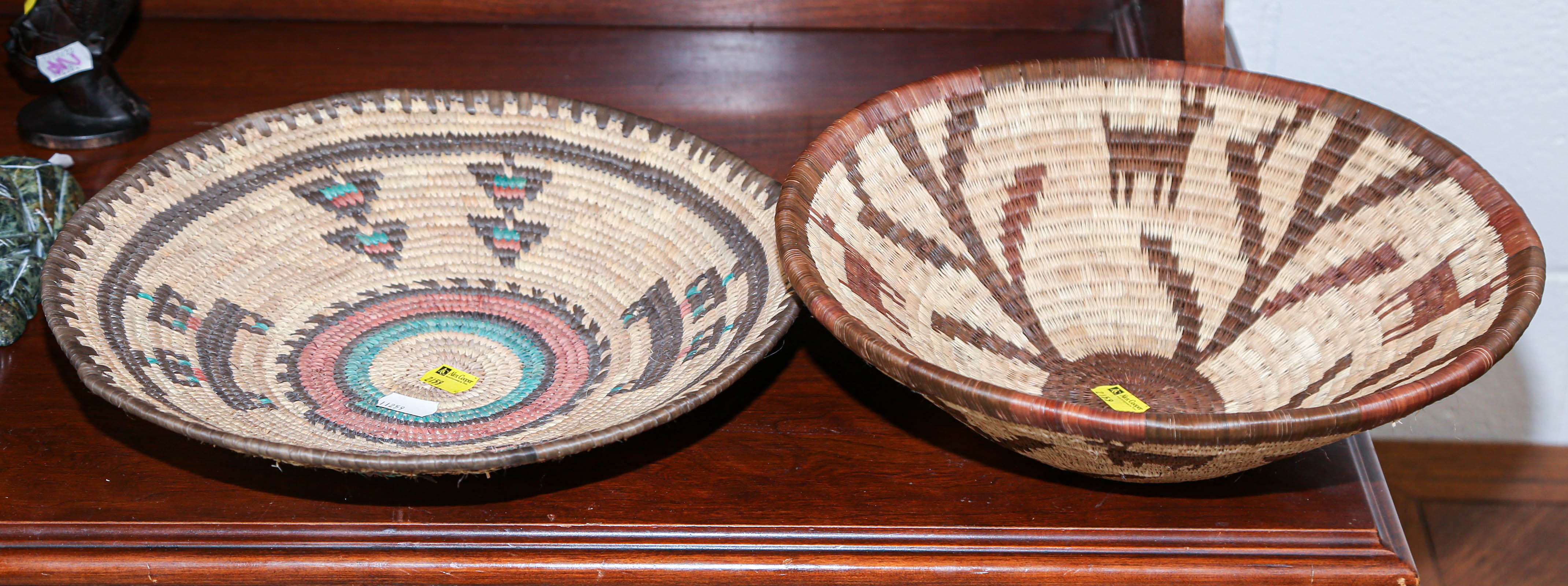 Appraisal: TWO NATIVE AMERICAN WOVEN BASKETS th century one measures in