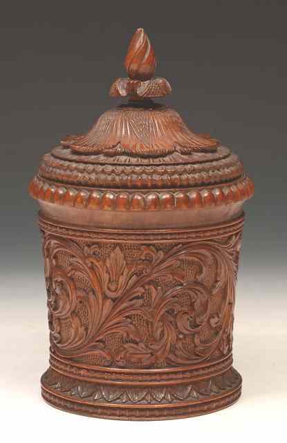 Appraisal: A TURNED AND CARVED TREEN TOBACCO BOX AND COVER with