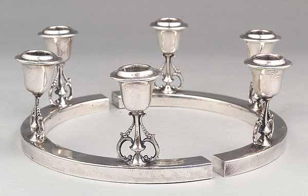 Appraisal: A Pair of Sterling Silver Three-Light Candle Holders each with