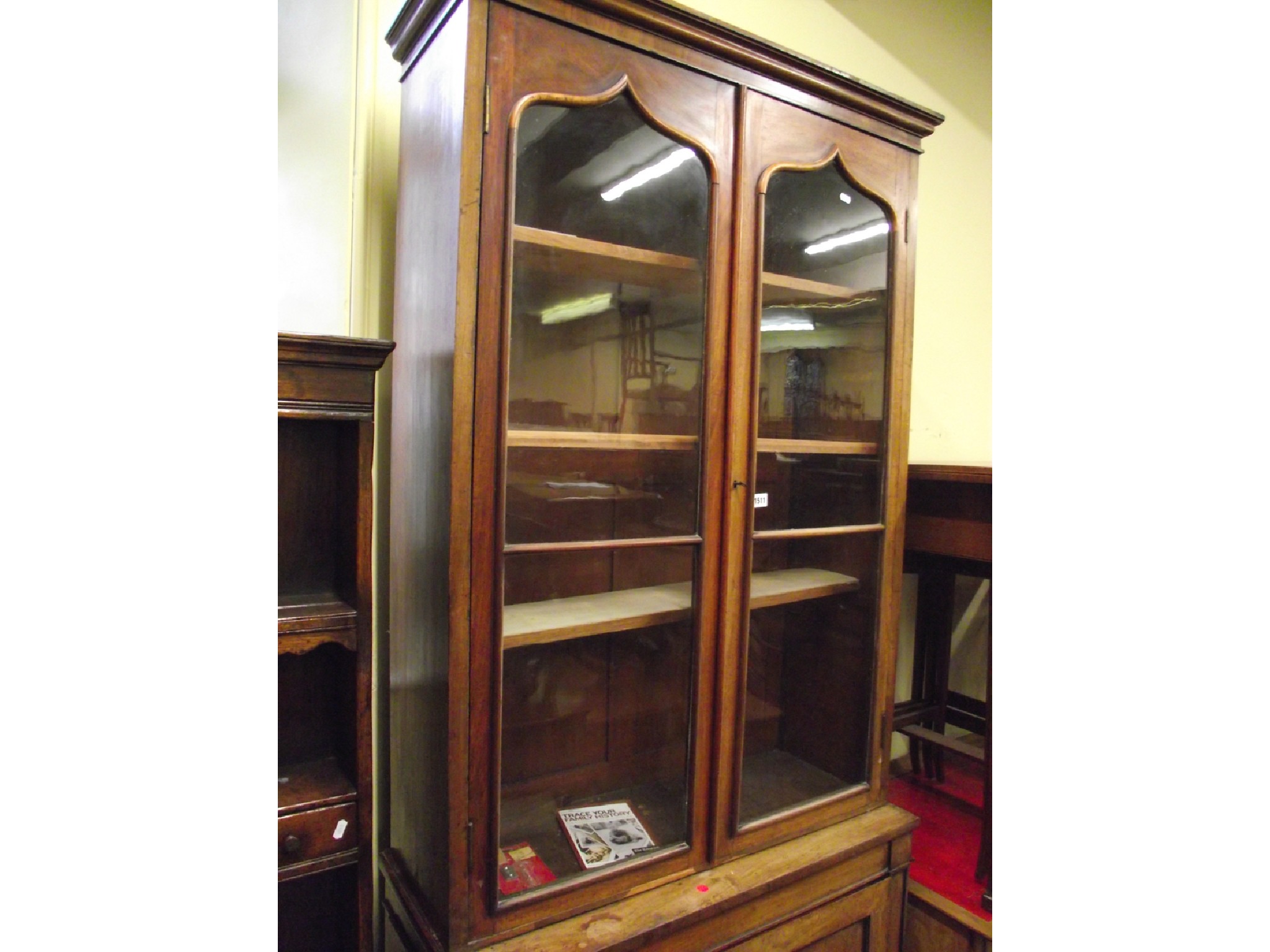 Appraisal: A Regency mahogany library bookcase the lower section enclosed by