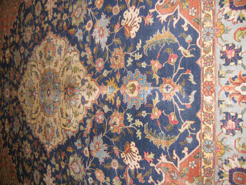 Appraisal: TABRIZ ROOM RUG The indigo field of curvilinear floral design