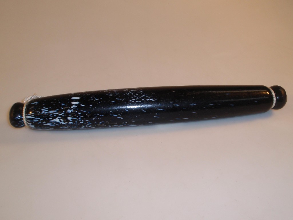 Appraisal: A Victorian Nailsea scene rolling pin black with white splash