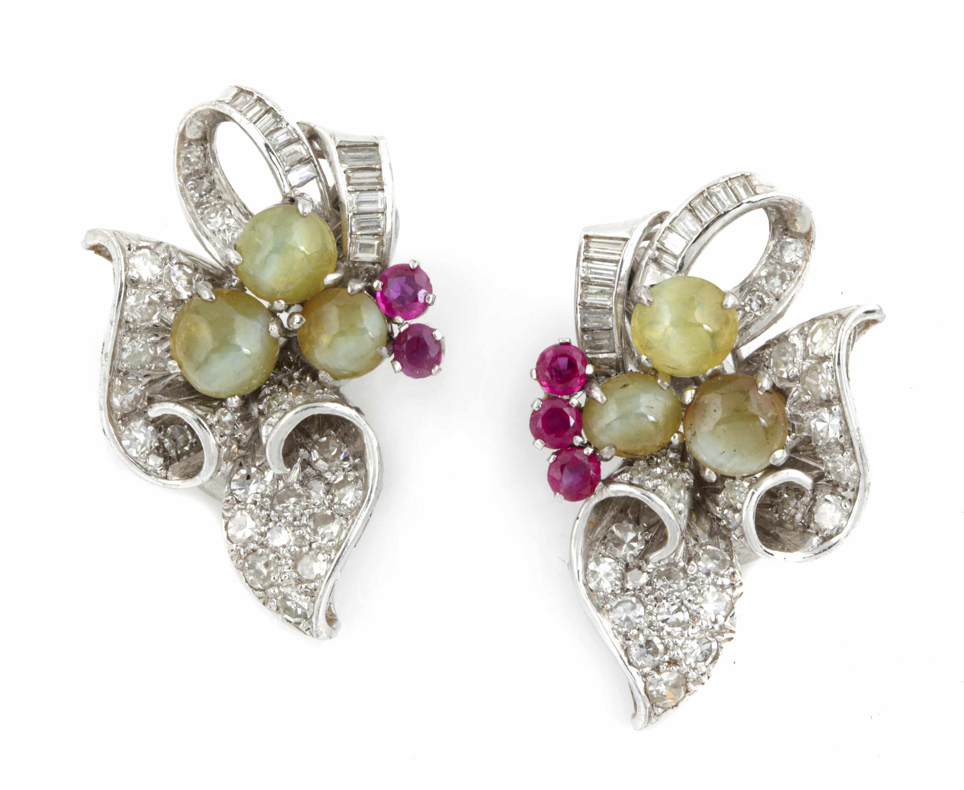 Appraisal: A pair of cat's eye chrysoberyl ruby and diamond earclips