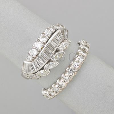 Appraisal: TWO DIAMOND RINGS Twenty-five stone diamond eternity band approx cts