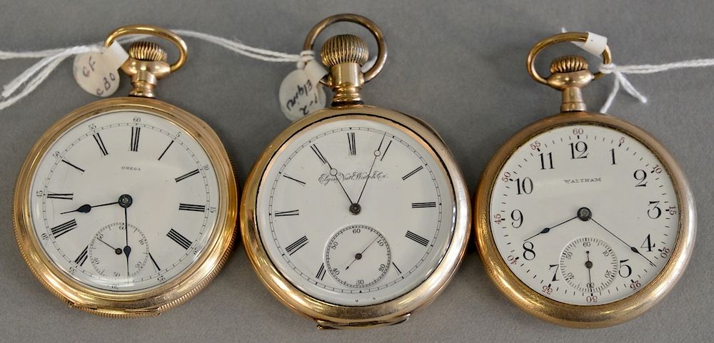 Appraisal: Three open face pocket watches gold filled faces marked Waltham