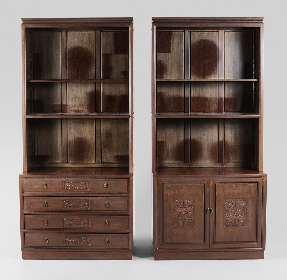 Appraisal: Two Similar Ming Style Carved Mahogany Bookcase Cabinets Chinese th