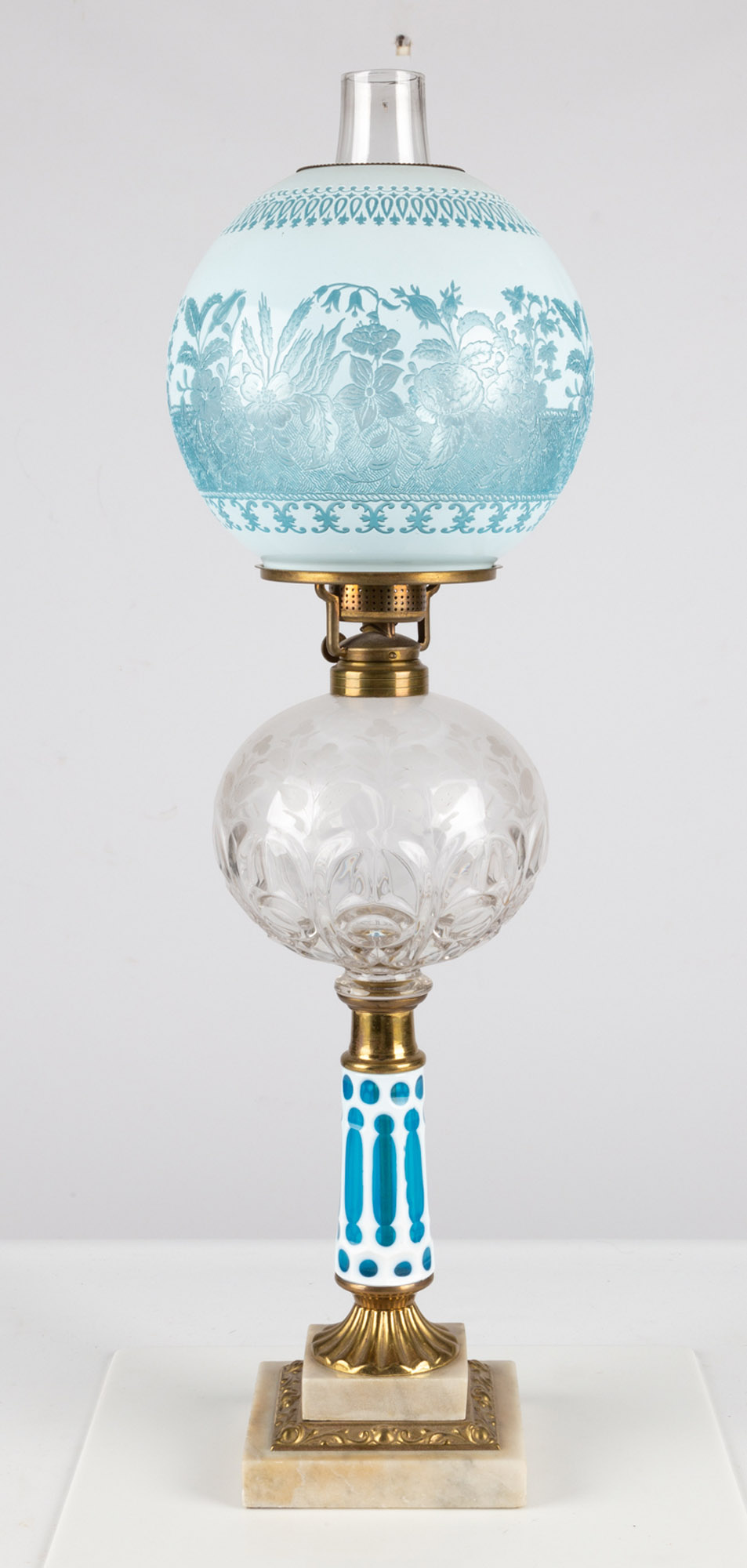 Appraisal: NOTCHED BULLS EYE LIGHT BLUE OVERLAY OIL LAMP WITH OVERLAY