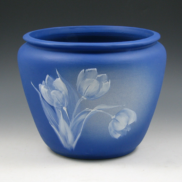 Appraisal: Very rare Owens matte blue Utopian jardiniere with slip-decorated tulips