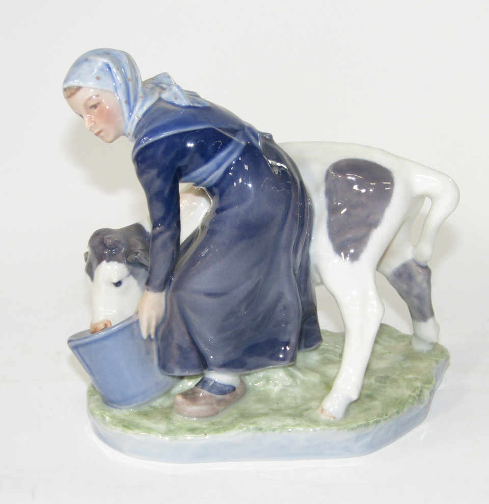 Appraisal: A Royal Copenhagen figure group of a young milk maid