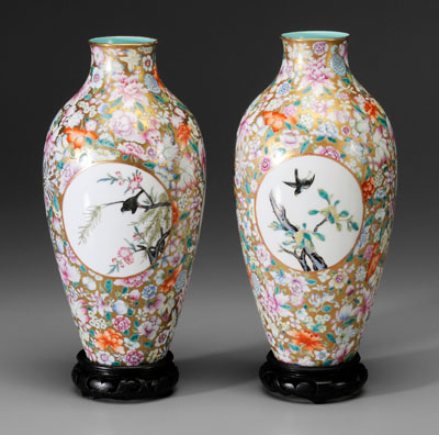 Appraisal: Pair Chinese famille rose vases tapered ovoid forms mille fleurs