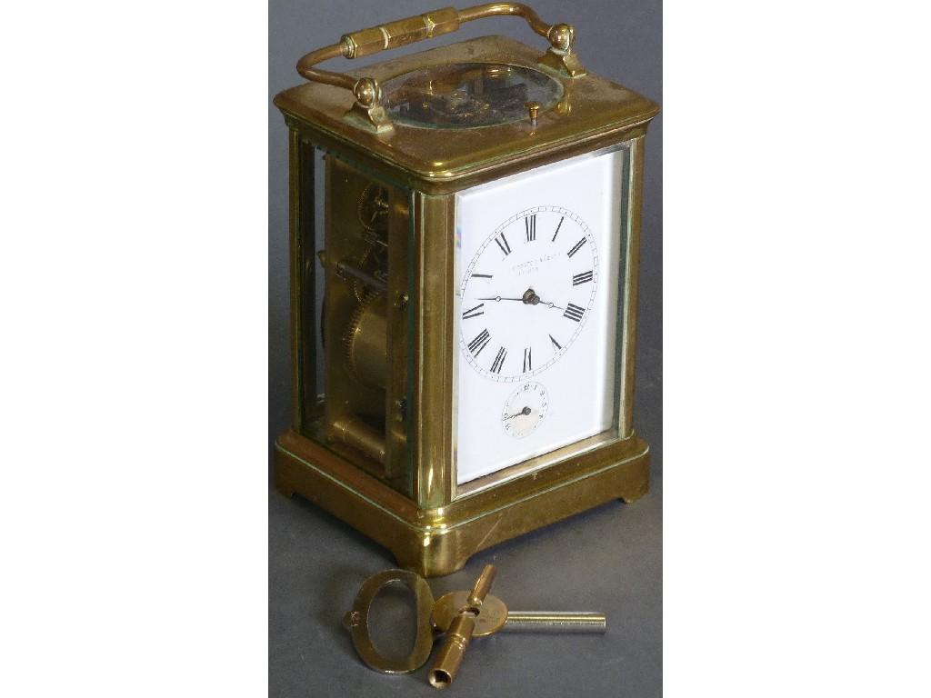 Appraisal: LATE NINETEENTH EARLY TWENTIETH CENTURY BRASS REPEATING CARRIAGE CLOCK with