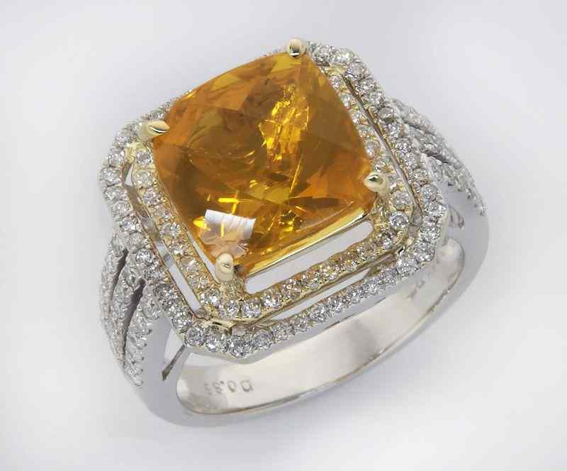 Appraisal: K gold diamond and fire opal ringfeaturing a square cushion