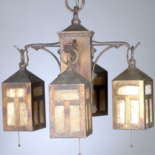 Appraisal: LIGHTING Copper and iron chandelier with four lanterns lined in