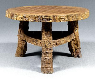 Appraisal: Rustic hardwood center table parquetry inlaid circular top with applied