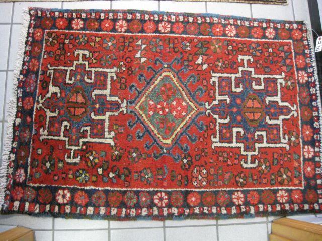 Appraisal: Heriz Persian Handmade Rug triple geometric medallions floral border '