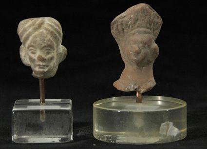 Appraisal: Two Teraacotta Indian Heads