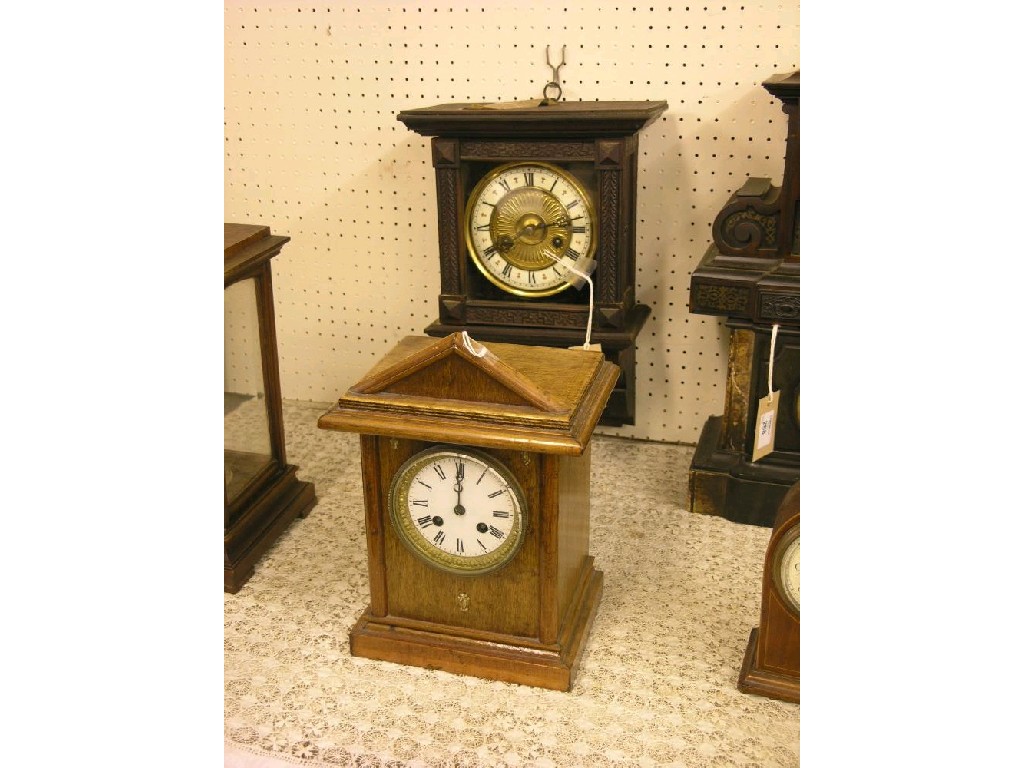 Appraisal: A Victorian wall hanging clock traditional dial and gong-striking movement