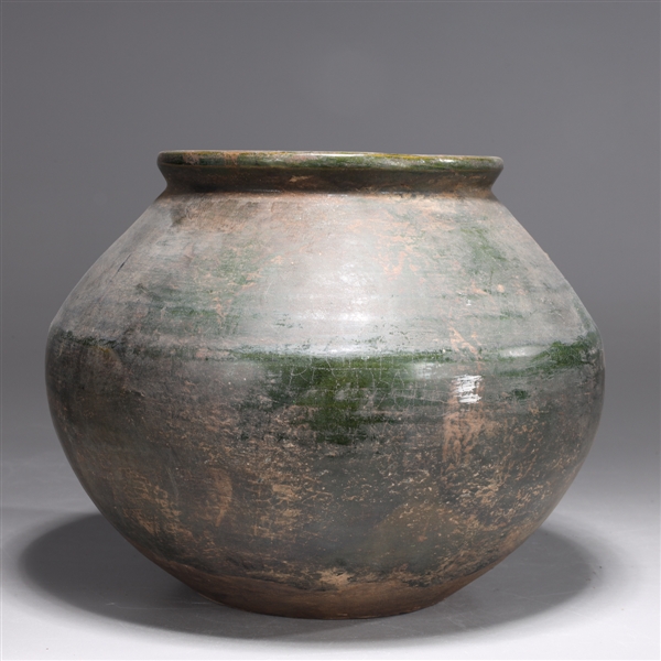 Appraisal: Chinese green glazed ceramic jar some soiling wear glaze and