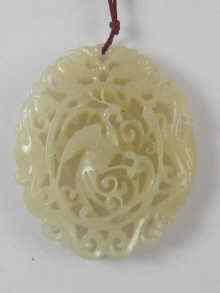 Appraisal: A Chinese pierced nephrite pendant of a Ho-Ho bird