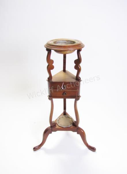 Appraisal: A Victorian smoking stand with metal ash trays top and