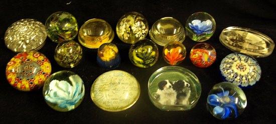 Appraisal: A clear glass paperweight of flower design Paris J Cie